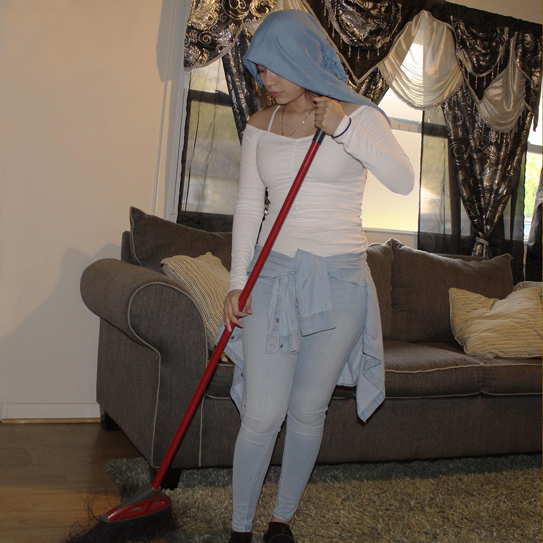 Woman with a broom